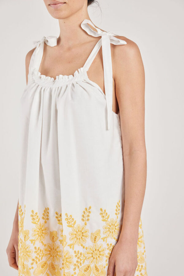 Status Quan Sunrise Serenade nightie in white cotton with yellow embroidery. Detail.